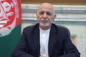 Afghan President Ashraf Ghani flees the country as Taliban forces enter the capital